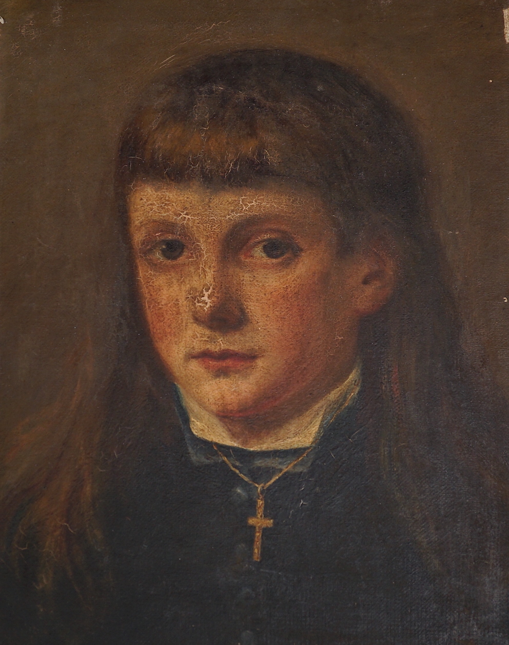 19th century English school, oil on canvas, Portrait of a youth wearing a crucifix, 34 x 27cm, unframed